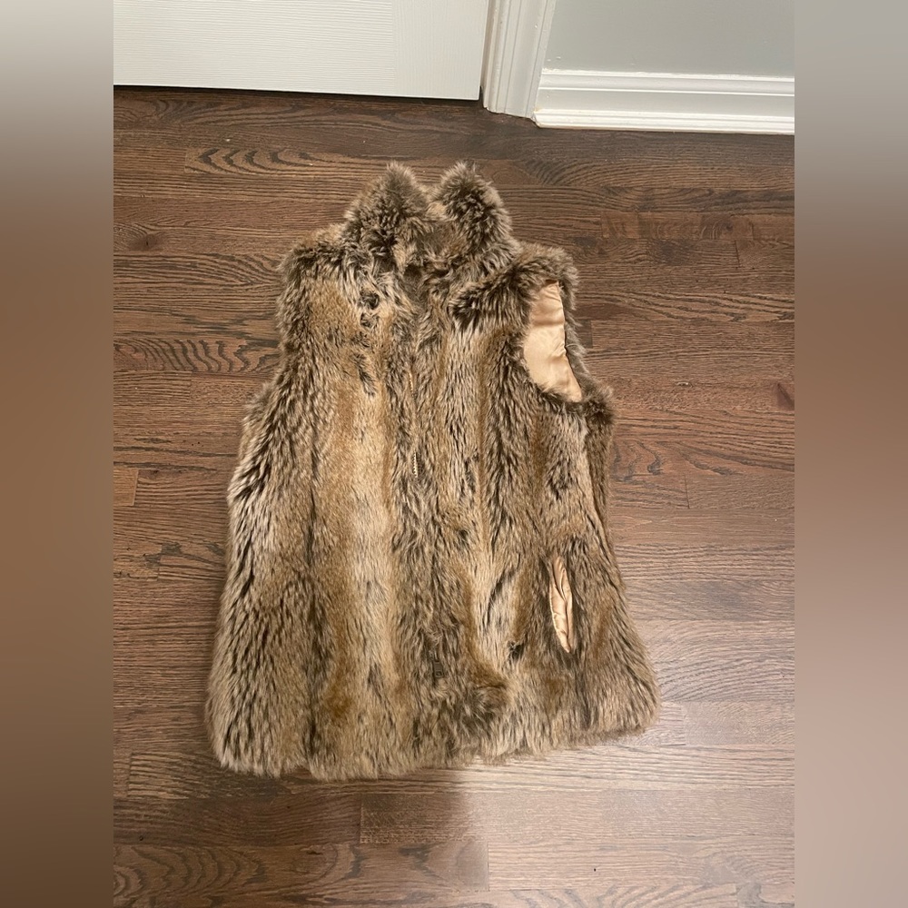 Faux fur vest. Beautiful caramel color. Size 4.